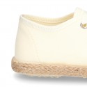 Special CEREMONY laces up shoes espadrille style with ties closure.