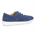 Classic suede leather Laces up shoes tennis style with ties closure and perforated design.