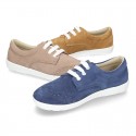 Classic suede leather Laces up shoes tennis style with ties closure and perforated design.