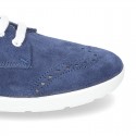 Classic suede leather Laces up shoes tennis style with ties closure and perforated design.