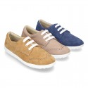 Classic suede leather Laces up shoes tennis style with ties closure and perforated design.