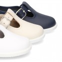 Little Washable leather T-strap shoes with buckle fastening.