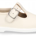 Little Washable leather T-strap shoes with buckle fastening.