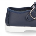 Little Washable leather T-strap shoes with buckle fastening.