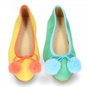 Soft suede leather classic ballet flats with pompons.