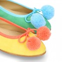 Soft suede leather classic ballet flats with pompons.