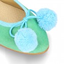 Soft suede leather classic ballet flats with pompons.