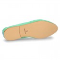 Soft suede leather classic ballet flats with pompons.