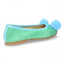 Soft suede leather classic ballet flats with pompons.