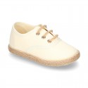 Special CEREMONY kids laces up shoes espadrille style.