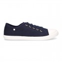 Cotton Canvas BAMBA type shoes with ties closure and toe cap.