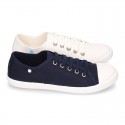 Cotton Canvas BAMBA type shoes with ties closure and toe cap.