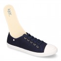 Cotton Canvas BAMBA type shoes with ties closure and toe cap.