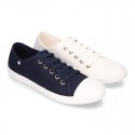 Cotton Canvas BAMBA type shoes with ties closure and toe cap.