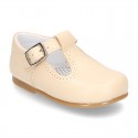 Classic Nappa Leather pepitos or T-strap shoes with buckle fastening.