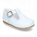 Classic Nappa Leather pepitos or T-strap shoes with buckle fastening.