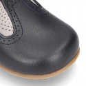 Classic Nappa Leather pepitos or T-strap shoes with buckle fastening.