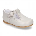 Classic Nappa Leather pepitos or T-strap shoes with buckle fastening.