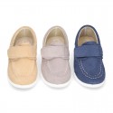 Suede leather Boat shoes with velcro strap.