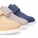 Suede leather Boat shoes with velcro strap.