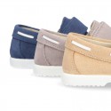 Suede leather Boat shoes with velcro strap.