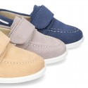 Suede leather Boat shoes with velcro strap.