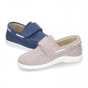 Suede leather Boat shoes with velcro strap.