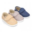 Suede leather Boat shoes with velcro strap.