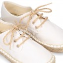 Laces up espadrille shoes in WHITE cotton canvas.