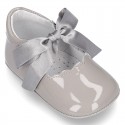 Patent leather Little Mary Janes angel style with waves and ties.