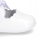 Patent leather Little Mary Janes angel style with waves and ties.