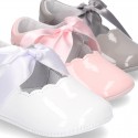 Patent leather Little Mary Janes angel style with waves and ties.