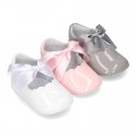 Patent leather Little Mary Janes angel style with waves and ties.