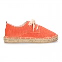 Laces up espadrille shoes in washing effect cotton canvas.