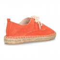 Laces up espadrille shoes in washing effect cotton canvas.