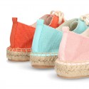 Laces up espadrille shoes in washing effect cotton canvas.