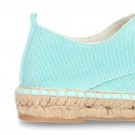 Laces up espadrille shoes in washing effect cotton canvas.