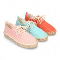 Laces up espadrille shoes in washing effect cotton canvas.