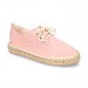 Laces up espadrille shoes in washing effect cotton canvas.