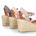 Wedge women canvas sandal espadrille with buckle fastening in washing effect.