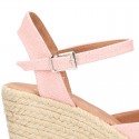 Wedge women canvas sandal espadrille with buckle fastening in washing effect.