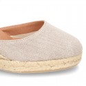 Wedge women canvas sandal espadrille with buckle fastening in washing effect.