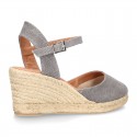 Wedge women canvas sandal espadrille with buckle fastening in washing effect.