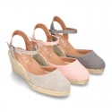 Wedge women canvas sandal espadrille with buckle fastening in washing effect.