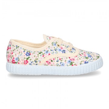 Bamba en lona con cordones y FLORES.