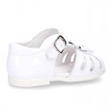 New patent leather sandals with ribbon and super flexible soles for little girls.