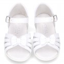 New patent leather sandals with ribbon and super flexible soles for little girls.