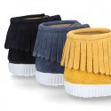 New suede leather Ankle boots with fringed design in seasonal colors.