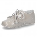 Classic OXFORD style shoes for baby in patent leather with linen.