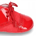 Classic OXFORD style shoes for baby in patent leather with linen.